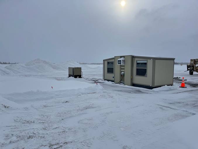 An actual ACE shelter deployed in a snowy landscape