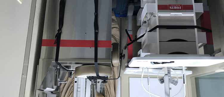 Medical furniture and equipment packed and restrained inside a documented C-FORTS clinic