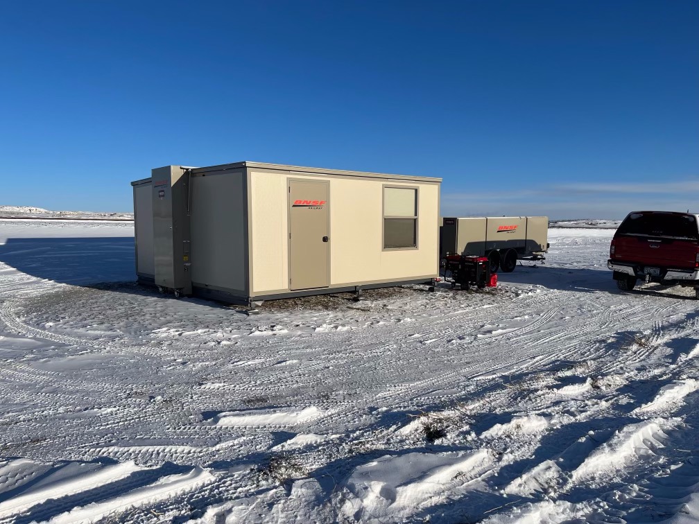 Actual BNSF-branded FORTS 38 deployed in snow with support equipment